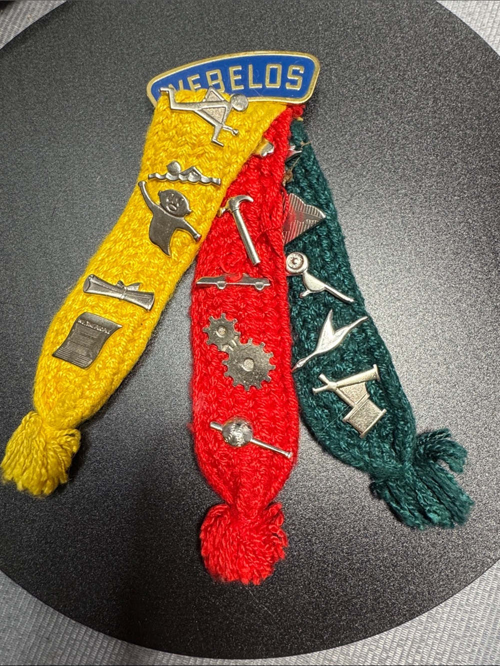 VTG Scout Knit Tassel Pin Display in Yellow, Red & Green